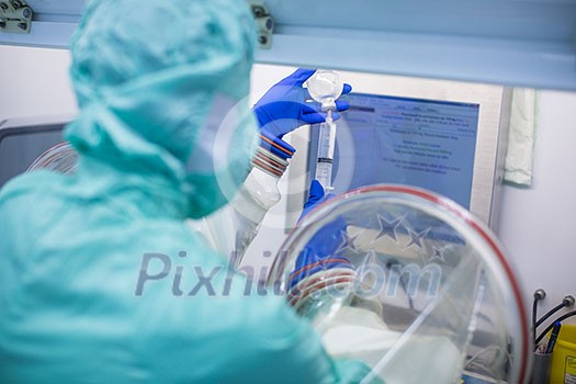 Cytostatic meds being prepared in a super clean lab environment - (shallow DOF; color toned image)