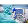 Cytostatic meds being prepared in a super clean lab environment - (shallow DOF; color toned image)