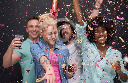 confetti party Multiethnics group of happy young people celebrating new year eve while dancing and have fun at home confetti party Multiethnics group of happy young people celebrating new year eve while dancing and have fun at home