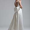 Portrait of beautiful young women in wedding dress isolated on a white background