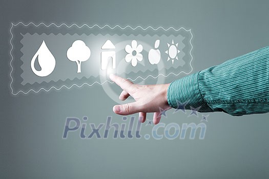 Hand of businessman pressing icons on virtual screen Hand of businessman pressing icons on virtual screen