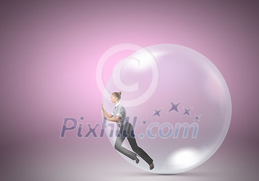 Young businesswoman trying to get out of soap bubble Young businesswoman trying to get out of soap bubble