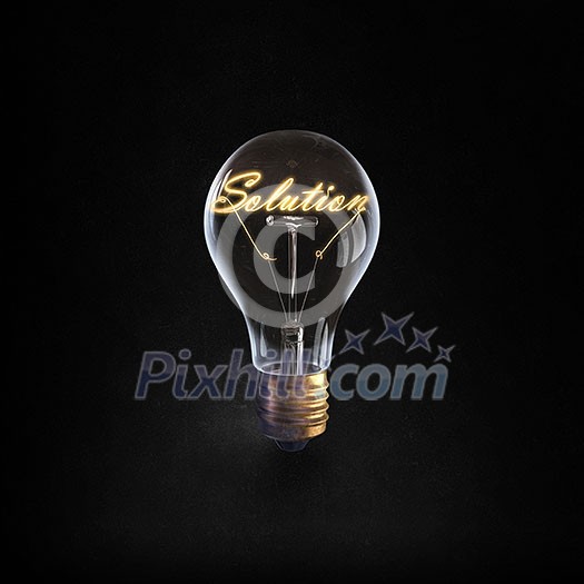 Glowing glass light bulb with word solution inside Glowing glass light bulb with word solution inside