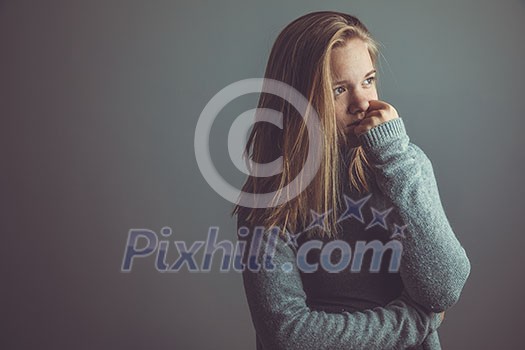 Young woman suffering from a severe stomach pain/depression/anxiety Young woman suffering from a severe stomach pain/depression/anxiety