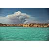 Scenic Sardinia island landscape with Corsica burning in distance - Sardinia sea ​​coast with azure clear water