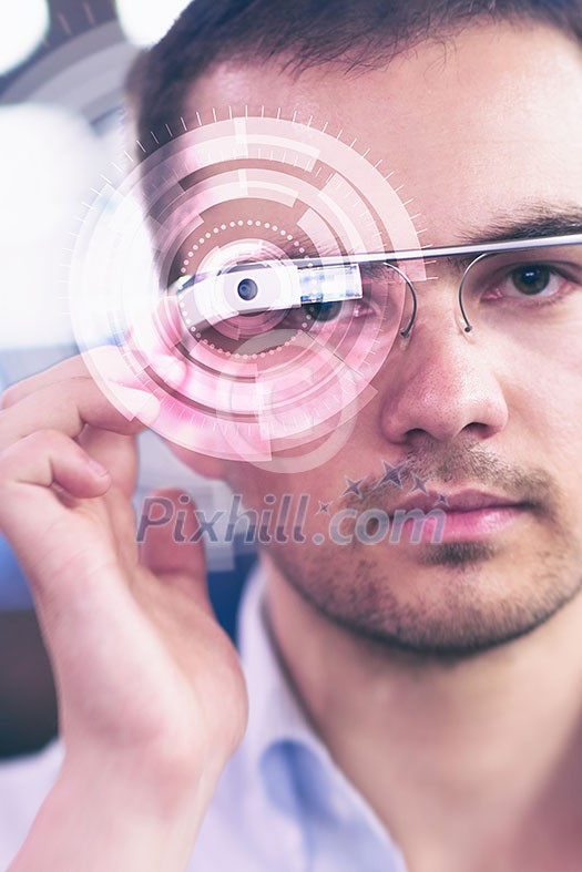 Picture of handsome programmer with futuristic glasses Picture of handsome programmer with futuristic glasses
