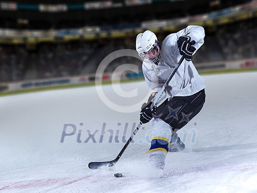 ice hockey player in action kicking with stick ice hockey player in action kicking with stick