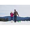 romantic winter  scene, happy young couple having fun on fresh show on winter vacatio, mountain nature landscape