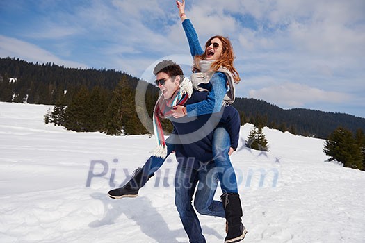 romantic winter scene, happy young couple having fun on fresh show on winter vacatio, mountain nature landscape romantic winter scene, happy young couple having fun on fresh show on winter vacatio, mountain nature landscape