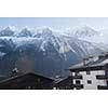 French alps mountain peaks covered with fresh snow. Winter landscape nature scene on beautiful sunny winter day.