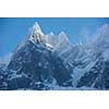 French alps mountain peaks covered with fresh snow. Winter landscape nature scene on beautiful sunny winter day.