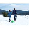 romantic winter  scene, happy young couple having fun on fresh show on winter vacatio, mountain nature landscape