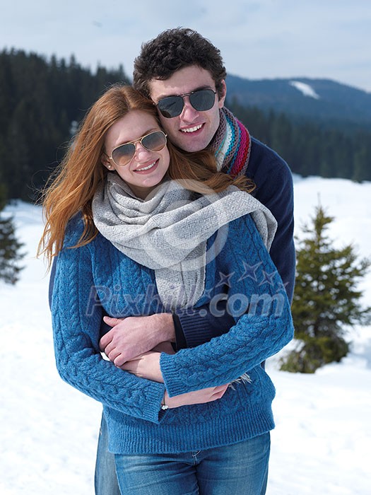 romantic winter scene, happy young couple having fun on fresh show on winter vacatio, mountain nature landscape romantic winter scene, happy young couple having fun on fresh show on winter vacatio, mountain nature landscape