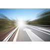 Conceptual image of asphalt road and direction arrow