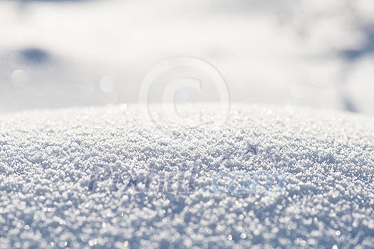 abstract winter background, fresh snow christmas  at sunny day with copy space and long shadow