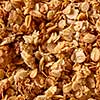 Healthy natural background with oat granola for diet vegetarian eating. Place under text. Top view.