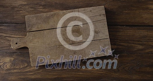 Woman's hands put fresh ripe halves of natural tropical fruit pineapple on a cutting board on a wooden background. Top view. Motion, 4K UHD video, 3840, 2160p. Woman's hands put fresh ripe halves of natural tropical fruit pineapple on a cutting board on a wooden background. Top view. Motion, 4K UHD video, 3840, 2160p.