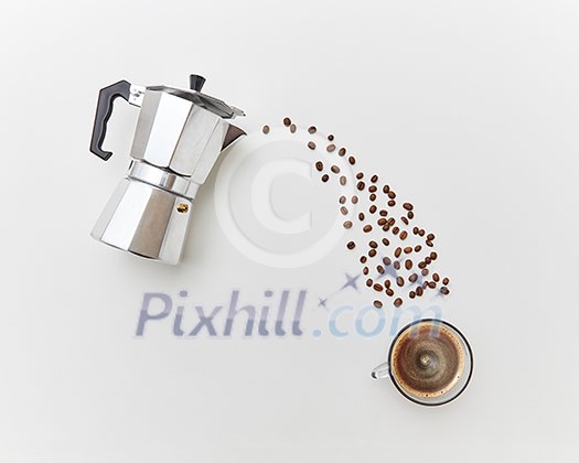Italian coffee maker and fresh coffee beans coffee beans in the form of a drink stream on a white background with copy space. Concept of morning breakfast. Top view. Italian coffee maker and fresh coffee beans coffee beans in the form of a drink stream on a white background with copy space. Concept of morning breakfast. Top view.