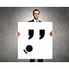 Businessman hold white board with sad face emoticon