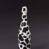 Creative painted wine bottle white with dark spots on a black background, copy space. Minimalism concept.
