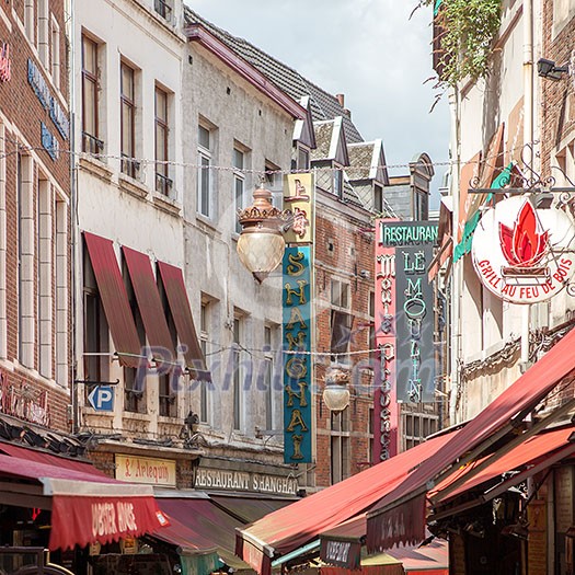 BRUSSELS, BELGIUM -February 17, 2014: famous street Ilot Sacré (also known as The Belly of Brussels) with many restaurants in Brussels, Belgium BRUSSELS, BELGIUM -February 17, 2014: famous street Ilot Sacré (also known as The Belly of Brussels) with many restaurants in Brussels, Belgium