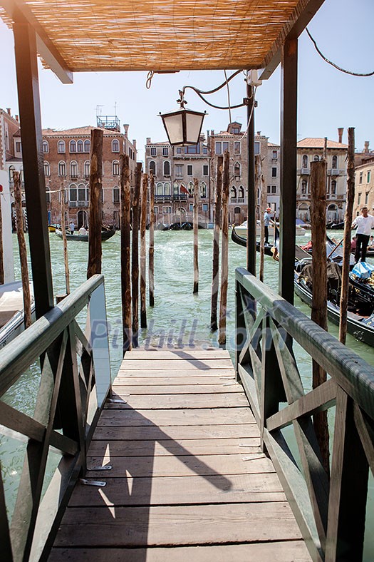 Pier on San Marco Canal and view on San Giorgio Maggiore, Venice, Italy. Gangway in Venice. Pier on San Marco Canal and view on San Giorgio Maggiore, Venice, Italy. Gangway in Venice.