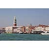 Campanila bell tower at piazza San Marco from other side of channel in Venice, Italy.