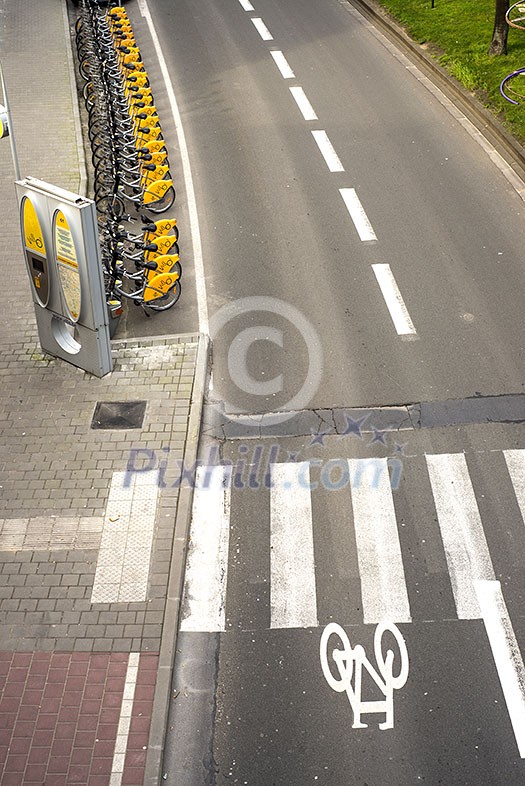 BRUSSELS, BELGIUM - February 24, 2014:City Bike docking station in Brussels. Villo Bike is a privately owned for-profit public bicycle sharing system that serves in Brussels BRUSSELS, BELGIUM - February 24, 2014:City Bike docking station in Brussels. Villo Bike is a privately owned for-profit public bicycle sharing system that serves in Brussels