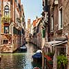 Venice, Italy, Grand Canal and historic tenements. Beautiful view of Grand Canal and old medival buildings.