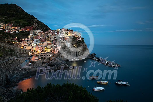 Manarola Village, Cinque Terre Coast of Italy. Manarola is a beautiful small town in the province of La Spezia, Liguria, north of Italy. Manarola Village, Cinque Terre Coast of Italy. Manarola is a beautiful small town in the province of La Spezia, Liguria, north of Italy.