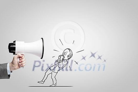 Close up of businessman hand holding megaphone Close up of businessman hand holding megaphone