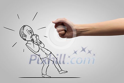 Close up of human fist fighting with businessman caricature