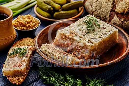 Traditional Russian meat aspic with mustard. Jellied meat.