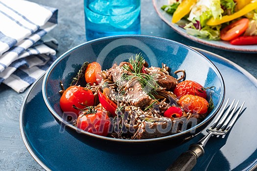 Soba noodles with beef, mushrooms, cherry tomato and sweet peppers.