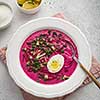 Cold beetroot soup with eeg and baked potato. Traditional ukraininan russian lithuanian soup.
