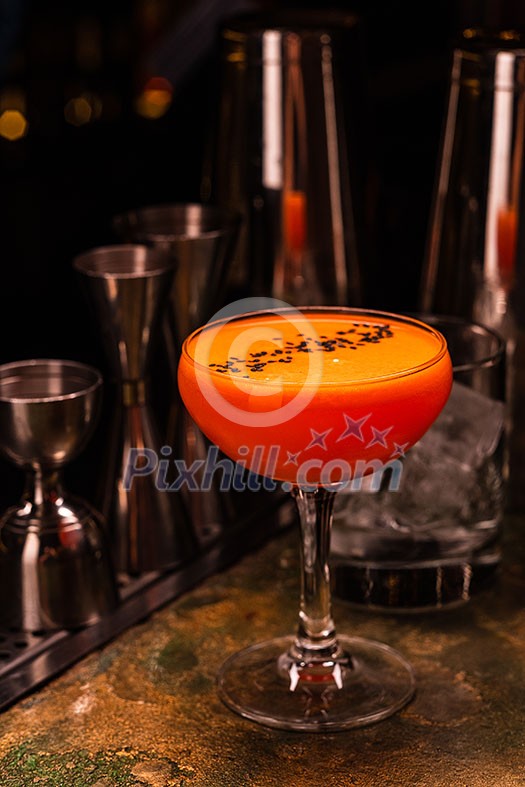 Alcoholic orange cocktail at the bar. Carrot Cocktail Alcoholic orange cocktail at the bar. Carrot Cocktail