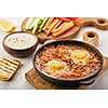 Shakshuka, Fried Eggs in Tomato Sauce. Traditional Mediterranean Fried Eggs. Israeli cuisine