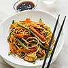 Asian noodles with pork in teriyaki sauce, with green beans, carrots and shiitake mushrooms