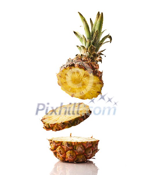 Fresh juicy pineaplle flying on white background. Ananas levitation