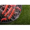 Grilled sausages on the grill. Top view. Outdoors.