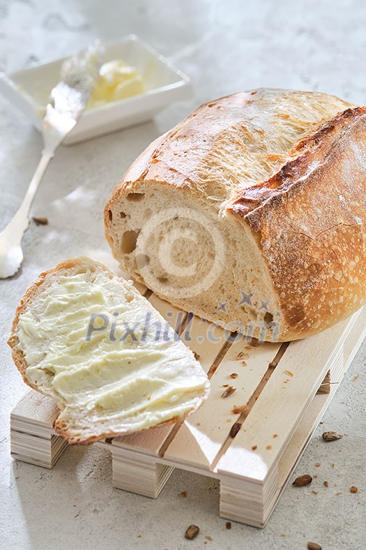 Freshly baked traditional bread. Bread and butter Freshly baked traditional bread. Bread and butter