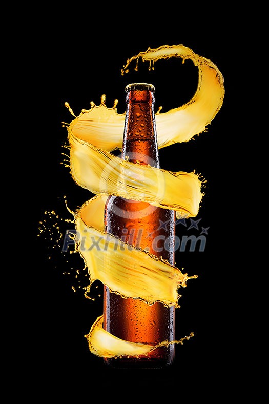 Creative glass bottle with water droplets on the surface with yellow spiral splash around it on a black background, copy space.