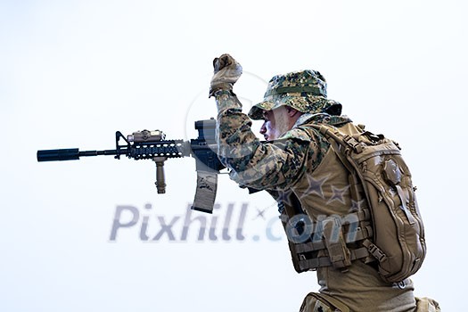 modern warfare american marines soldier in action while sneaking and aiming on laseer sight optics in combat position and searching for target in battle modern warfare american marines soldier in action while sneaking and aiming on laseer sight optics in combat position and searching for target in battle