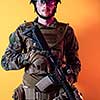 modern warfare marine soldier with fire arm weapon and protective army tactical gear clothes Studio shot  isolated on yellow background