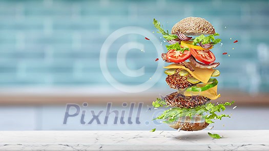 Video of homemade delicious burger with dancing fresh ingredients - two grilled beef cutlets, bacon, tomatoes and lettuce, cheese and sesame bun above a murble kitchen table. 4K UHD video 3840, 2160p. Video of homemade delicious burger with dancing fresh ingredients - two grilled beef cutlets, bacon, tomatoes and lettuce, cheese and sesame bun above a murble kitchen table. 4K UHD video 3840, 2160p.