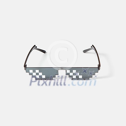 Protective art pixel glasses using for work with computers screens, phones and TV on a light grey background, copy space. Protective art pixel glasses using for work with computers screens, phones and TV on a light grey background, copy space.
