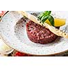 Fresh tasty beef tartare. Minced meat with ingredients for tartar.
