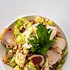 Grilled chicken breast salad with figs, green apple, celery, nuts and Parmesan