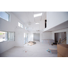 Interior of unfinished stylish modern open space two level apartment with white walls soon ready to move in