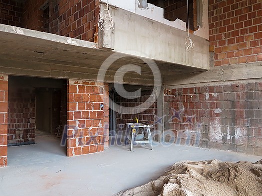 construction site interior of new two levels apartment with windows and red brick walls construction site in progress to new house construction site interior of new two levels apartment with windows and red brick walls construction site in progress to new house